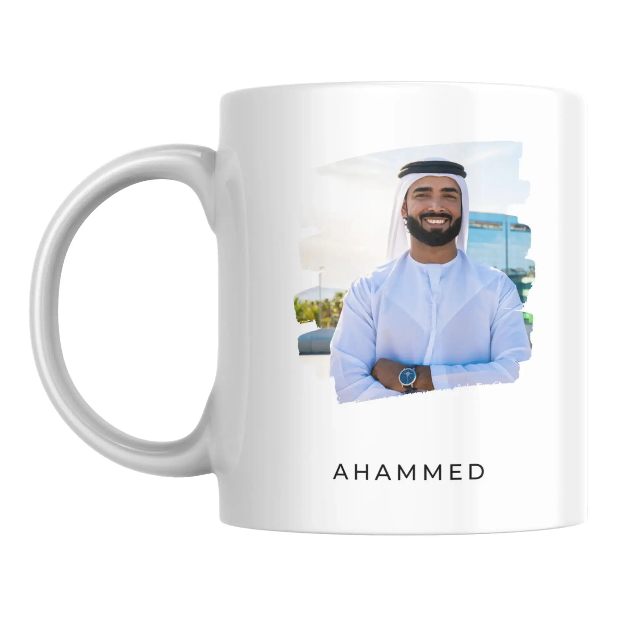 White mug with a printed photo of a man and the name 'Ahammed' on a white background