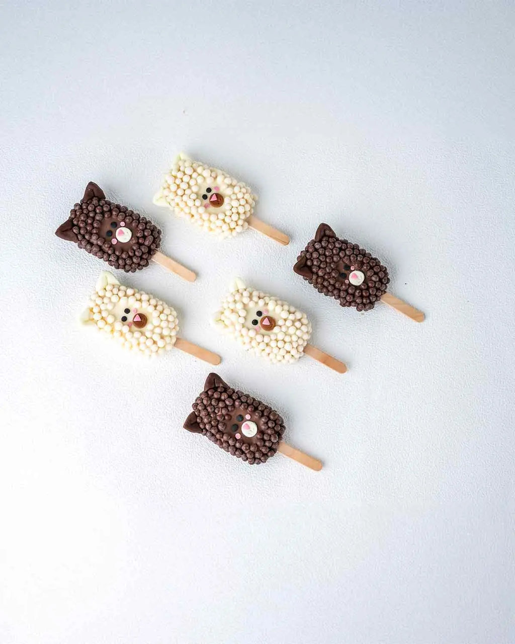 6-sheep-white-and-dark-chocolate-cakesicles-dubai