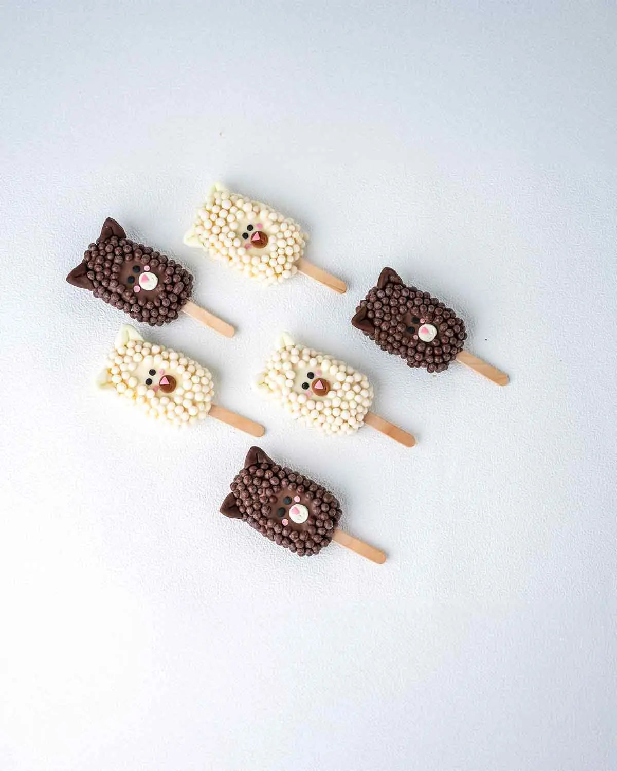 6-sheep-white-and-dark-chocolate-cakesicles-dubai