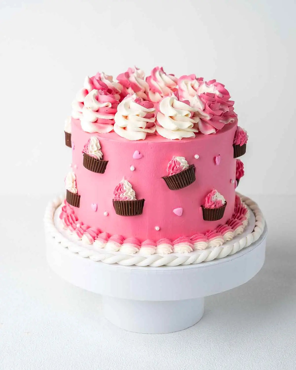 1kg-pink-cups-and-cream-cake-by-cravings-dubai