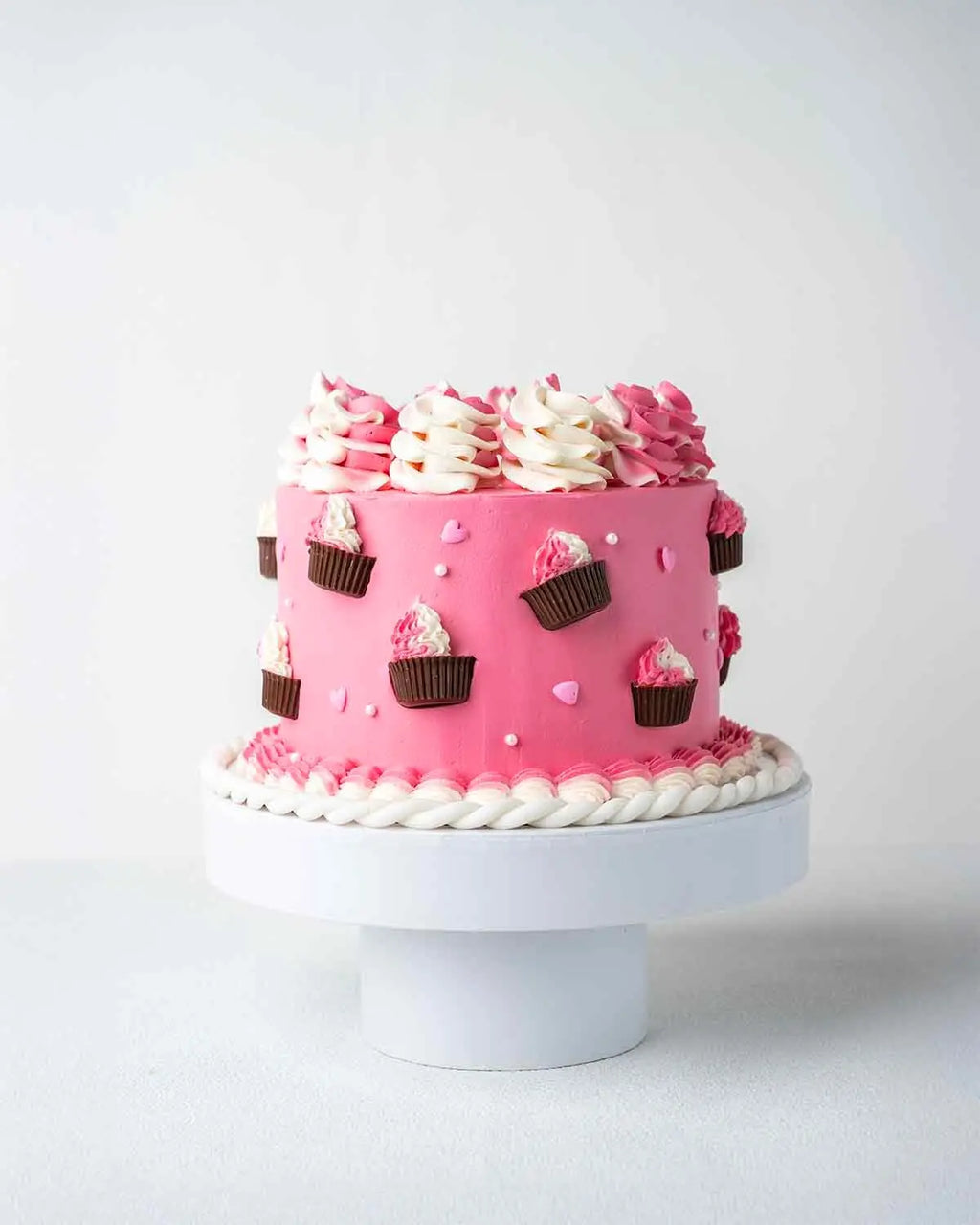 1kg-pink-cups-and-cream-cake-by-cravings-dubai