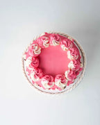 1kg-pink-cups-and-cream-cake-by-cravings-dubai