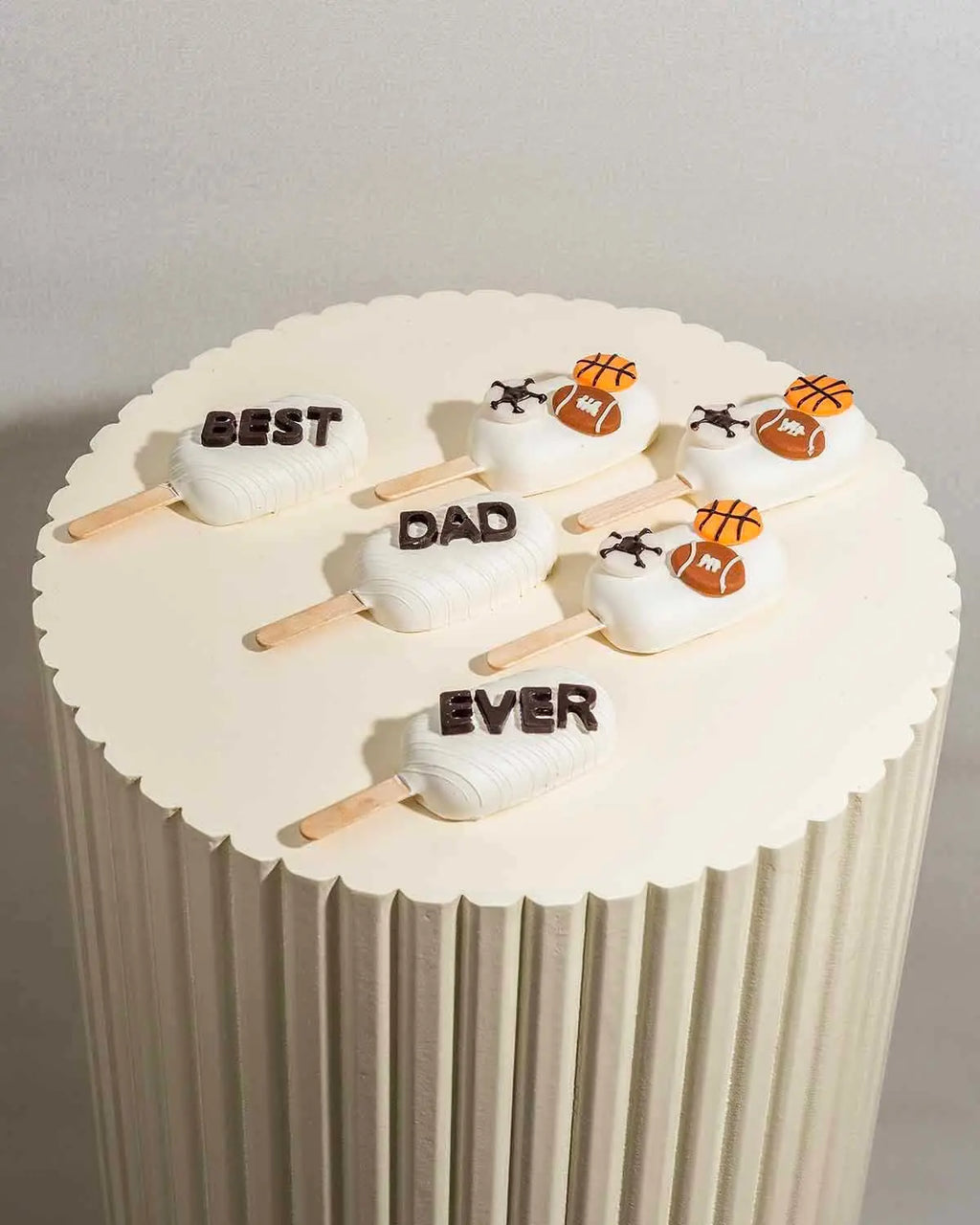 ball-game-theme-cakesicles-dubai