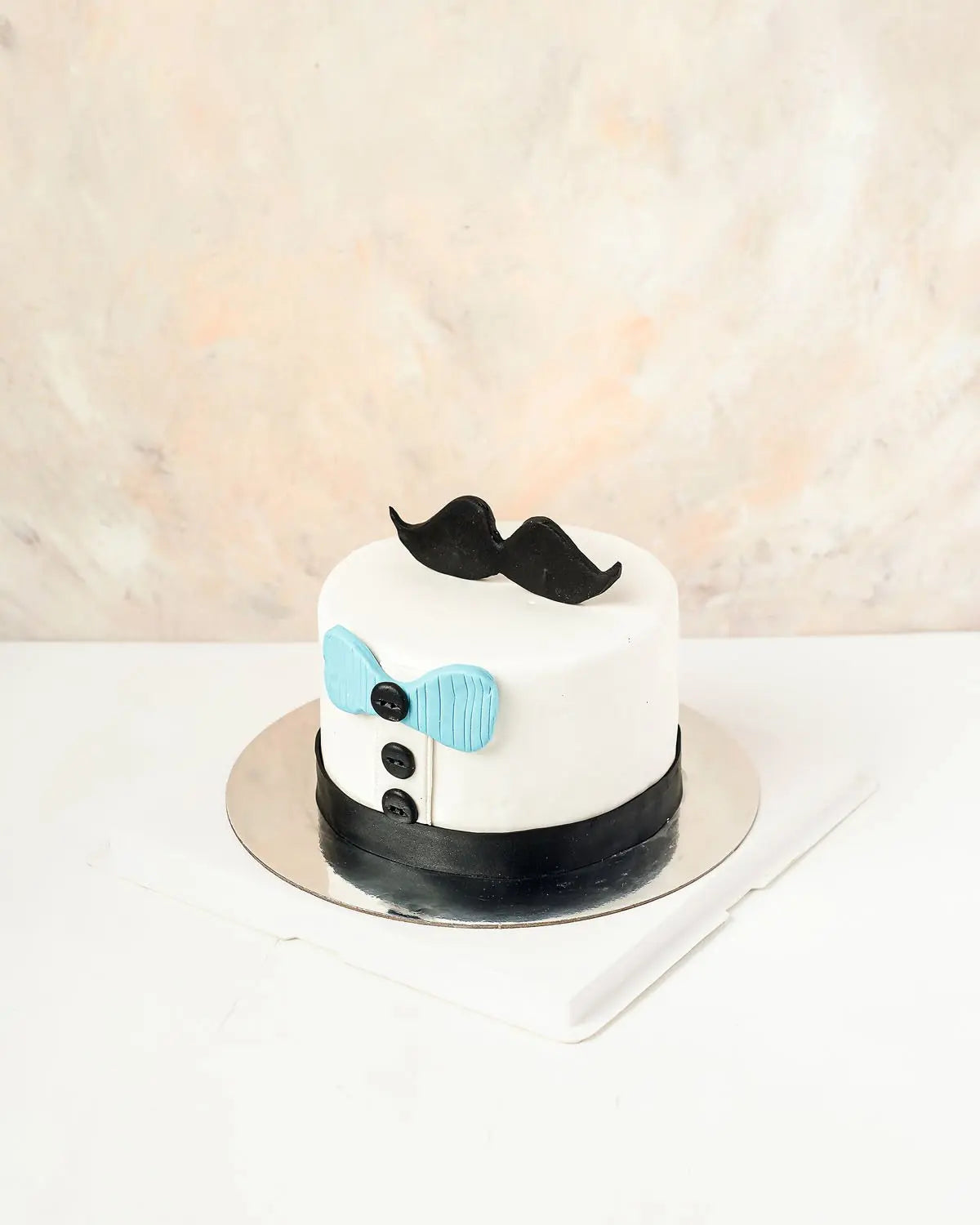 mini-cake-with-bow-tie-dubai