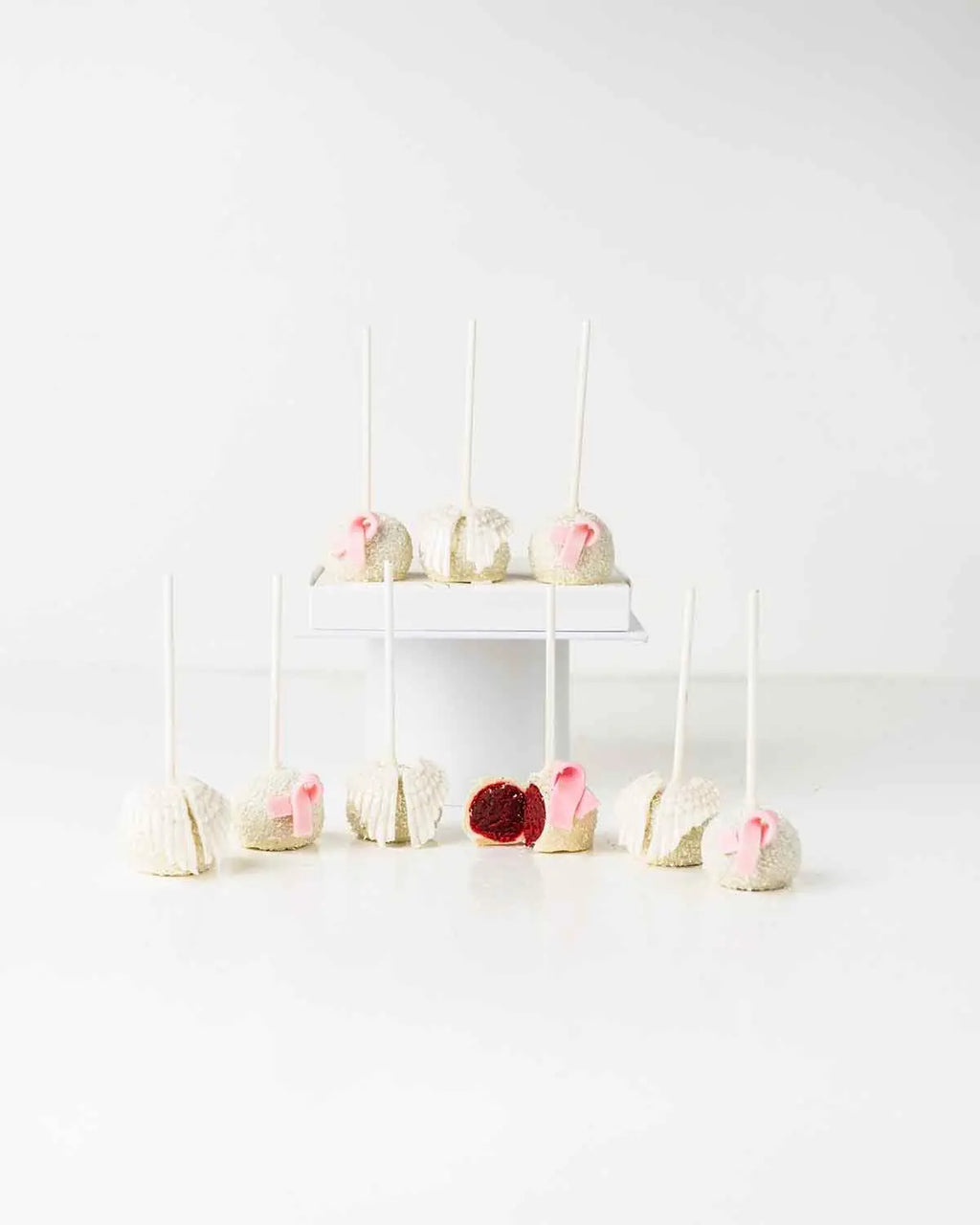 bow-and-wings-white-chocolate-cake-pops-dubai