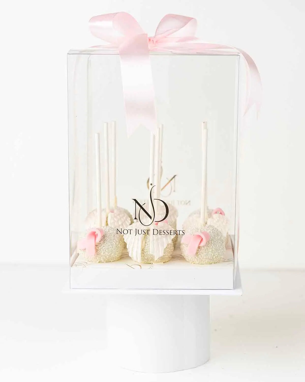 bow-and-wings-white-chocolate-cake-pops-dubai